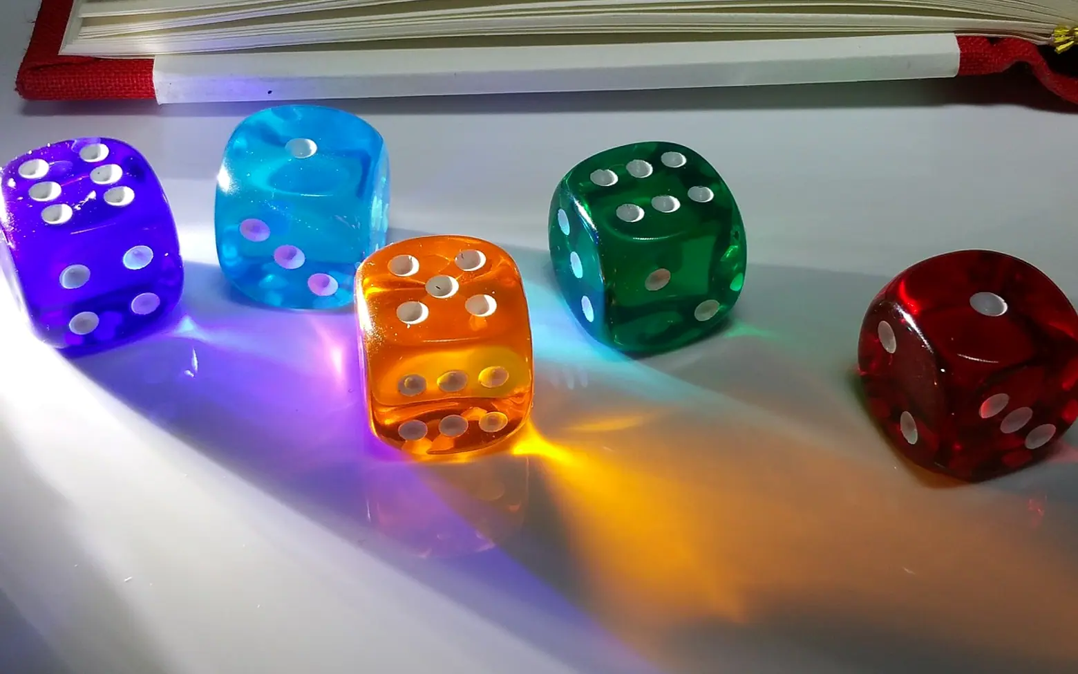 A book, happiness and lucky dice